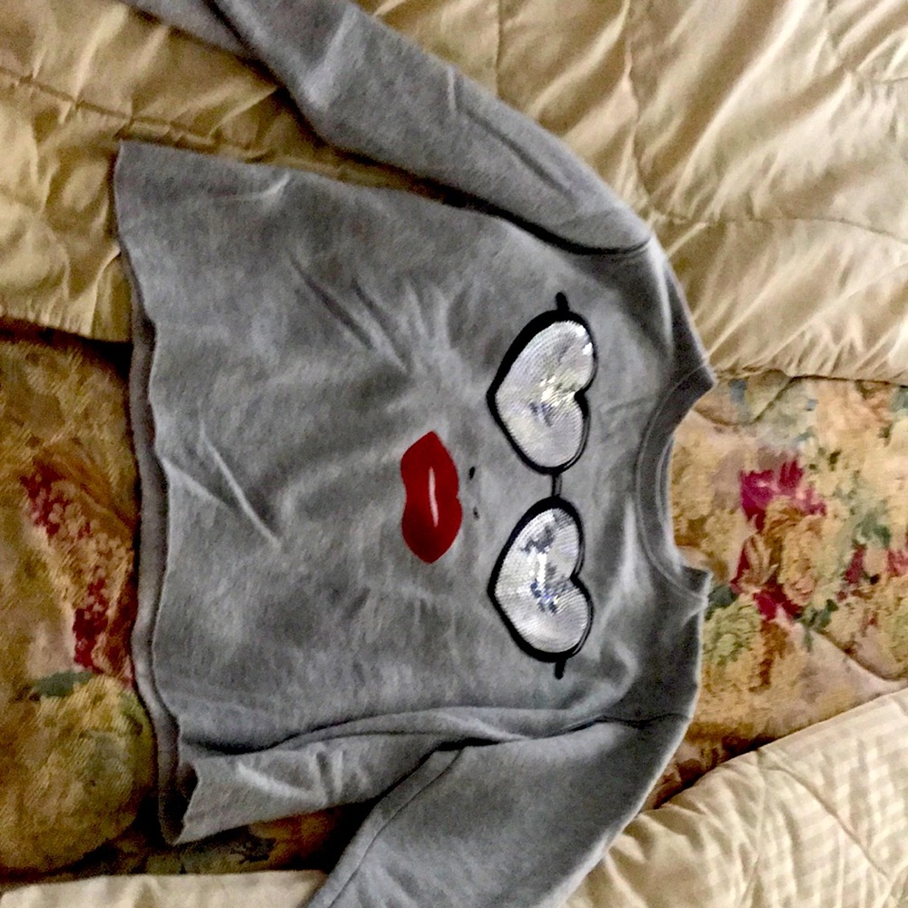 A grey long sleeve shirt